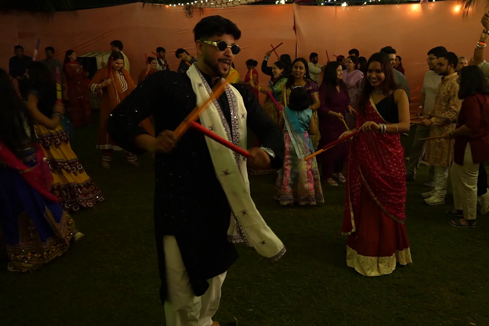 Ashish plays dandiya in the middle of the circle at Suncity Garba Ni Raat 2.0